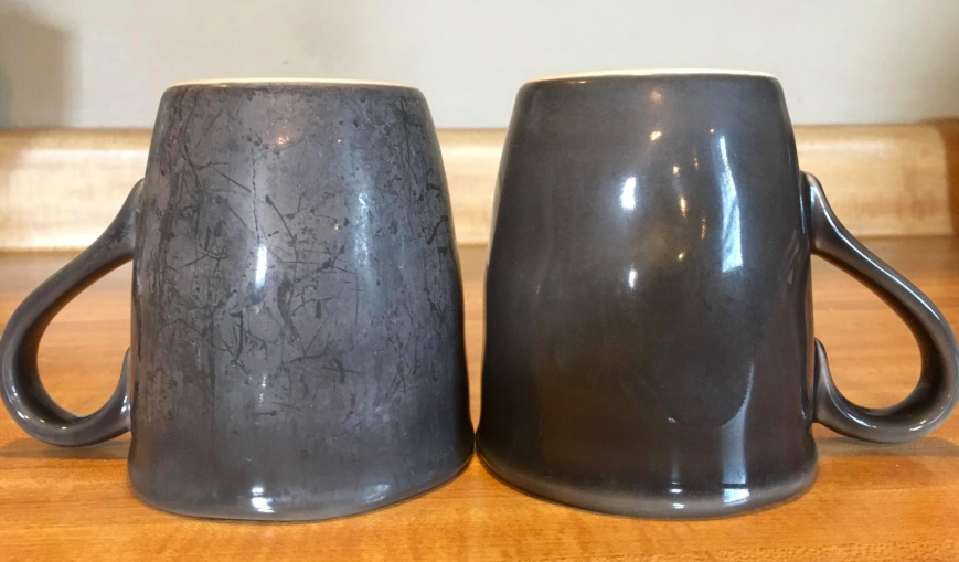 reviewer photo of stained mug next to a clean mug after using powder