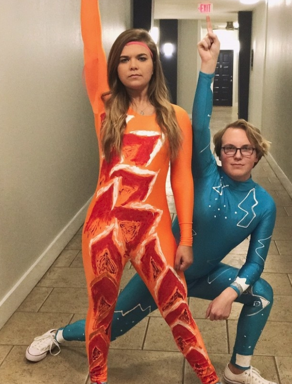 Two people in colorful unitard skate outfits