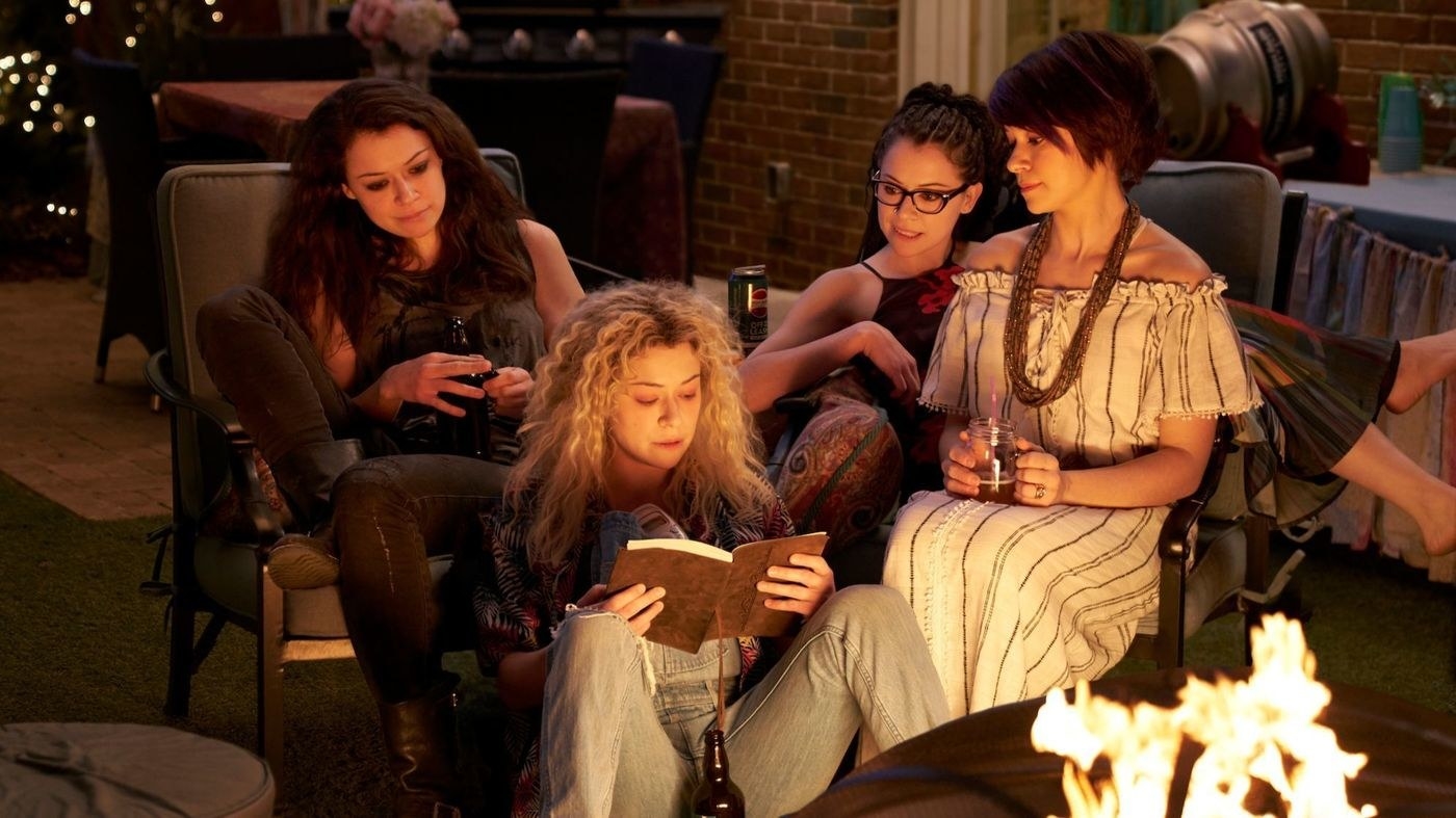 Characters from Orphan Black sitting around together