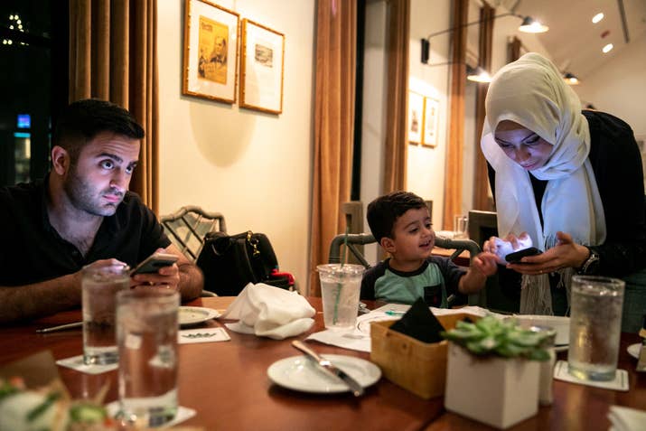 Mohammad Arif and Fatima Elkabti dine out with their son, Zakaria, in Tyler.