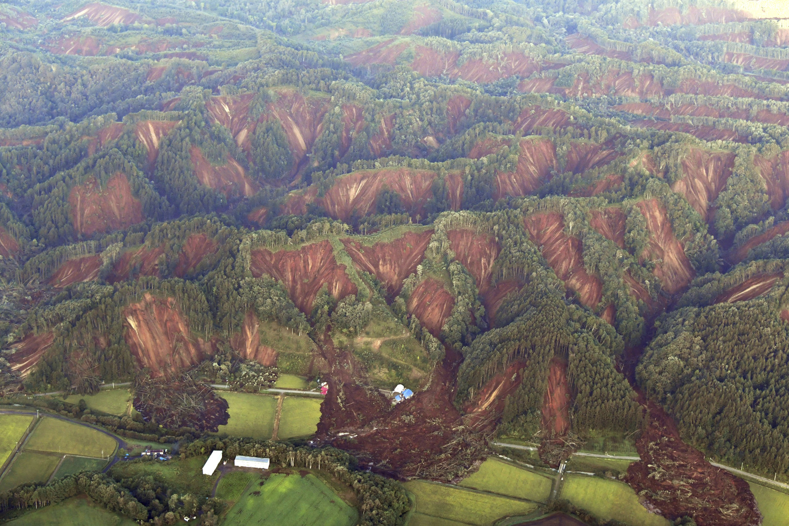 An aerial photo shows landslides in Atsuma, Hokkaido.