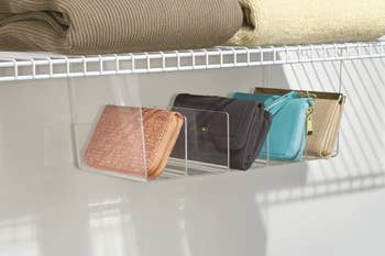 clear shelf with dividers to hold wallets