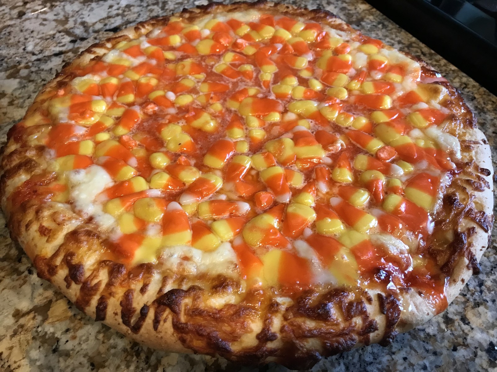 Candy Corn Pizza Is The Viral Trend No One Asked For, So Obviously We