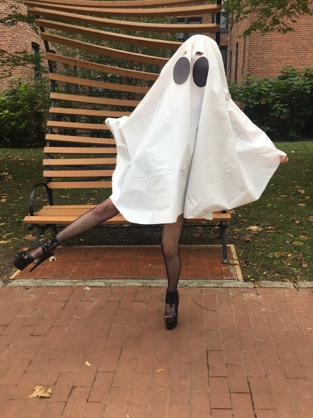 person in a ghost costume and high heels
