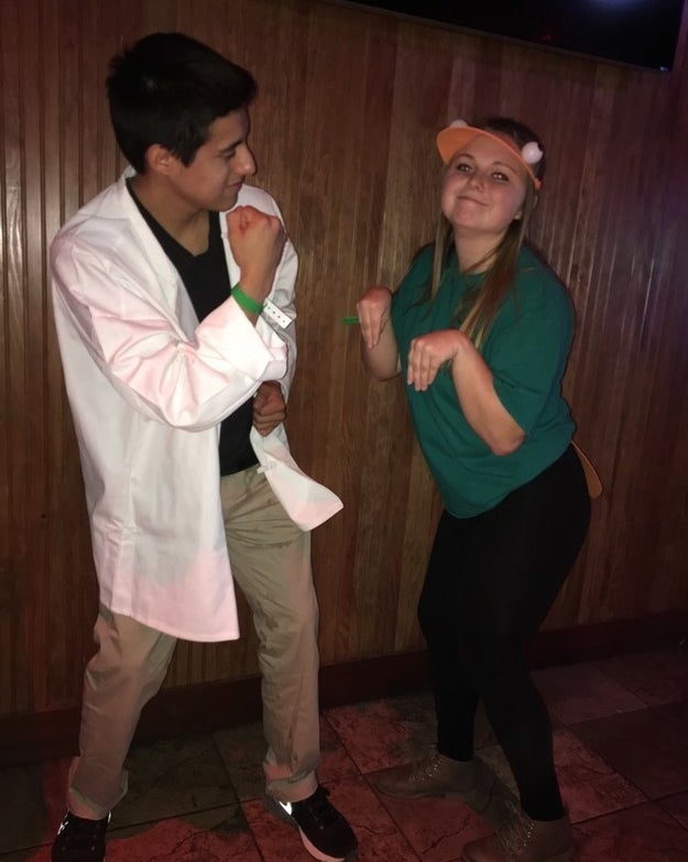 A couple dressed as Dr. Doofenshmirtz &amp;amp; Perry the Platypus from Phineas and Ferb