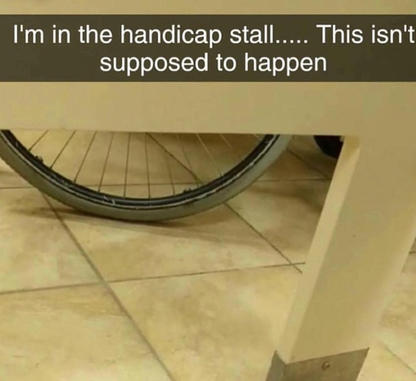 A person using a handicapped stall sees the wheel of a wheelchair waiting outside the stall and says &quot;This isn&#x27;t supposed to happen&quot;