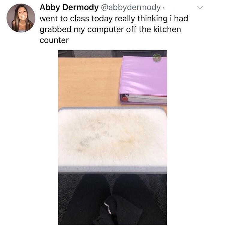 A cutting board on a desk with the text &quot;Went to class today really thinking I had grabbed my computer off the kitchen counter&quot;