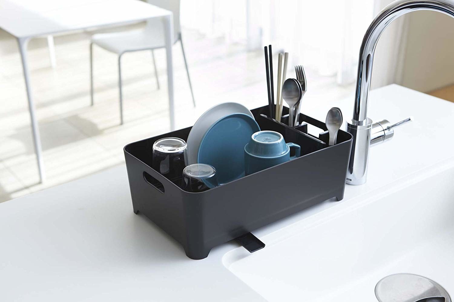 The dish draining rack in a black color