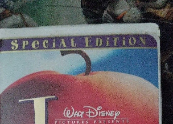 A Disney VHS tape with the corner chewed on