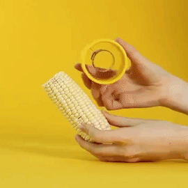 gif of circular device that strips corn 