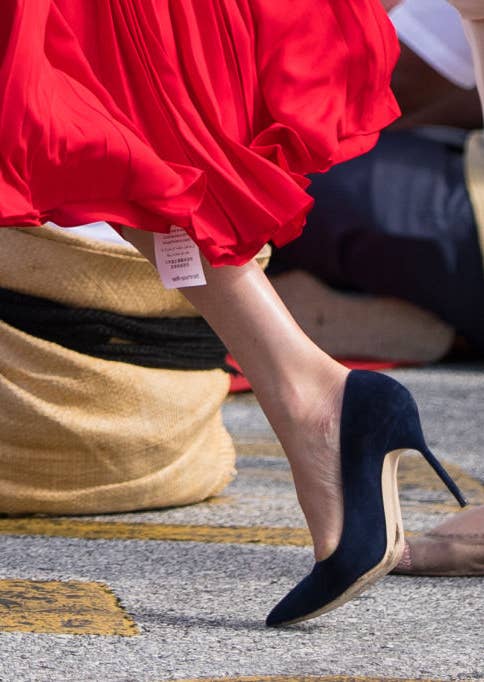 meghan markle red dress tag Let's not call Meghan Markle's forgotten dress tag a 'blunder' - it's no big deal
