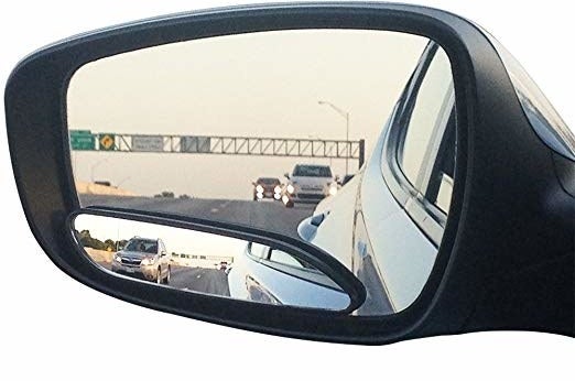 the blindspot mirror in-use on a car 