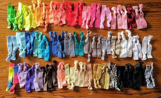 reviewer&#x27;s organized pack of rainbow hair ties