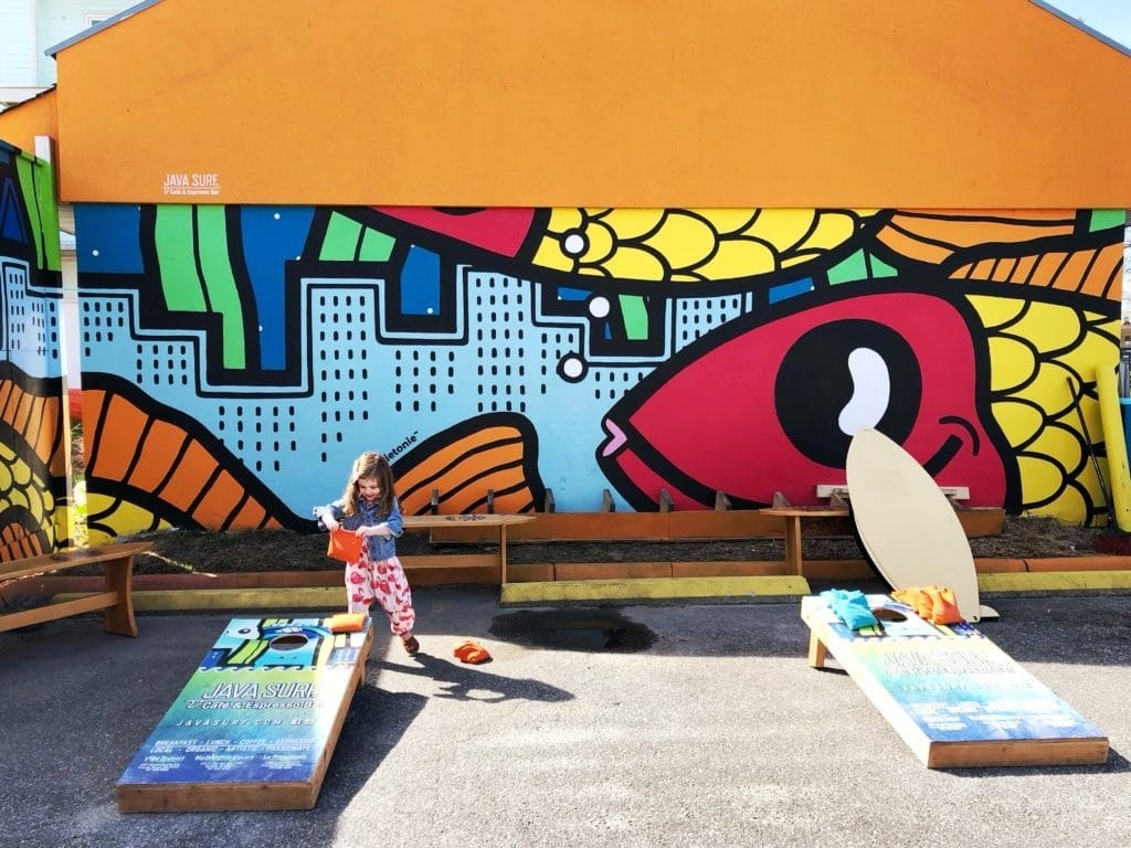 Just a couple blocks inland from the Virginia Beach Oceanfront, the ViBe Creative District is the newest art and cultural hub where artists across different disciplines like music, culinary, and traditional art can showcase their respective practices.ViBe Creative District was established by a group of local businesses and individuals to attract creative industries to a section of the Virginia Beach oceanfront area that needed revitalizing. The district's mission is "to promote, support, connect, and inspire the arts and creative industries to boost our local economy, grow jobs, and enhance our quality of life" with a vision of creating and reviving economic vibrancy in the neighborhood with local vibe.