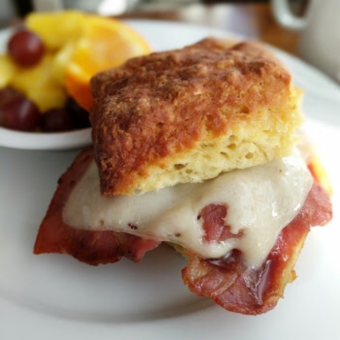 Serving breakfast and lunch all day, The Bee & The Biscuit is another local favorite located in Pungo, Virginia Beach. This charming cottage restaurant specializes in fresh made, buttery biscuits, biscuit-inspired dishes like the Orange Ham Biscuit (Orange Zest biscuit with country ham and melted Swiss cheese), massive Colossal Cinnamon Roll, and creative latte with whipped cream on top.