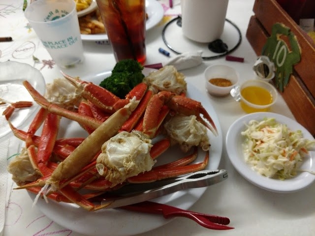 The unassuming Margie & Ray's Crab House, located on a dirt road called Sandbridge Road, is a local favorite that whips up classic plates and sandwiches like Fried Seafood Combo (fish, scallops, shrimp, and oysters), Lump Crabcake Sandwich with choice of sides from hushpuppies, cole slaw, French Fries, and Apple sauce, and the famous Hurricane Margie Platter, which includes generous portions of fried shrimp, scallops, crabcakes, clam strips, oysters, fish filets, French fries, hushpuppies, and cole slaw.
