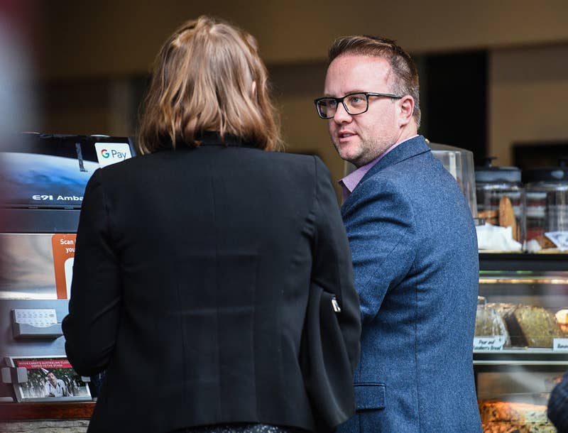 Journalist Jonathon Moran (right) is being sued by Geoffrey Rush.