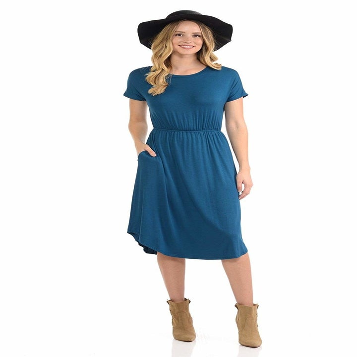 model wearing cinch waist midi dress  in blue