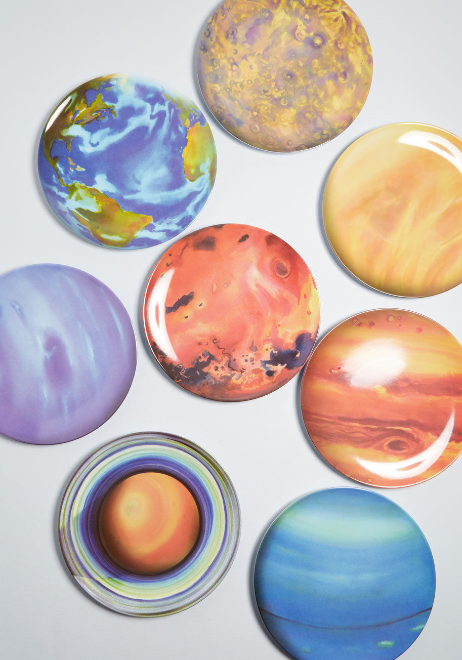 The eight plates that look like all the different planets, including earth, mars, etc