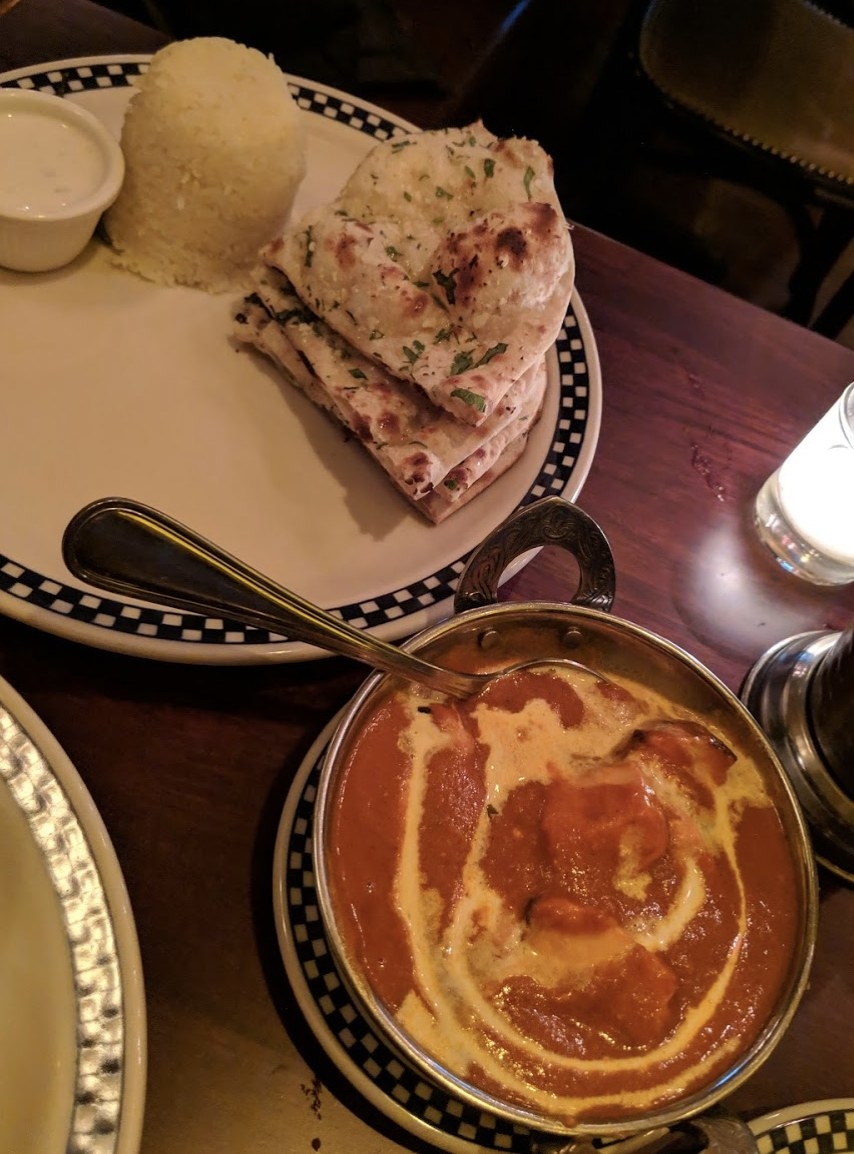 An Indian classic, the Chicken Tikka Masala includes tandoor-fired chicken tikka (your choice of white or dark meat) in creamy tomato sauce. The curry is served with naan, basmati ghee-rice, and raita.