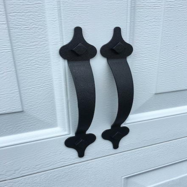 Close-up of reviewer's handles on garage, that look like iron with iron rivets