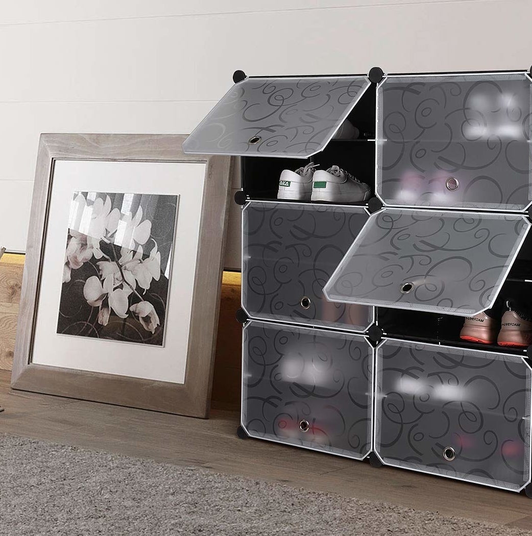 plastic cabinet with six cubbies, each cubby holds 1-2 pairs