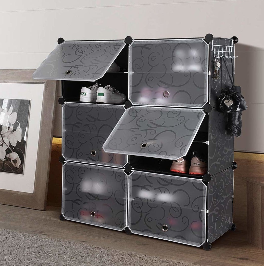 plastic cabinet with six cubbies, each cubby holds 1-2 pairs