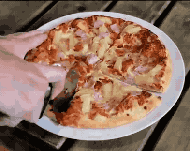 Here&#39;s How To Properly Eat Pineapple Pizza