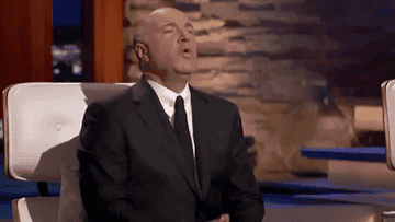 Gif of Kevin O&#x27;Leary on Shark Tank saying &quot;Ooo&quot; and rubbing his palms together in anticipation
