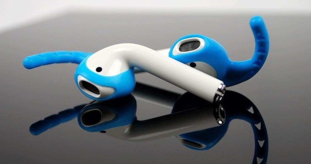 A pair of Airpods with the blue hook grips attached