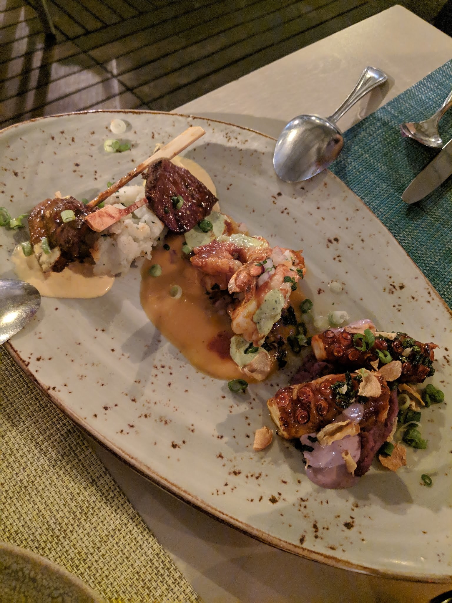 The second course kicks off the warm appetizer of anticuchos. Start with the Pulpo, or smoked octopus on a bed of whipped purple potato with crispy garlic, olive aioli, and piquillo pepper. The Jumbo Shrimp anticucho is perfectly grilled and complemented by sweet, creamy kabocha puree. The Corazon, or beef hearts, are grilled to perfection and served with potato puree, carretillero sauce, and scallions.