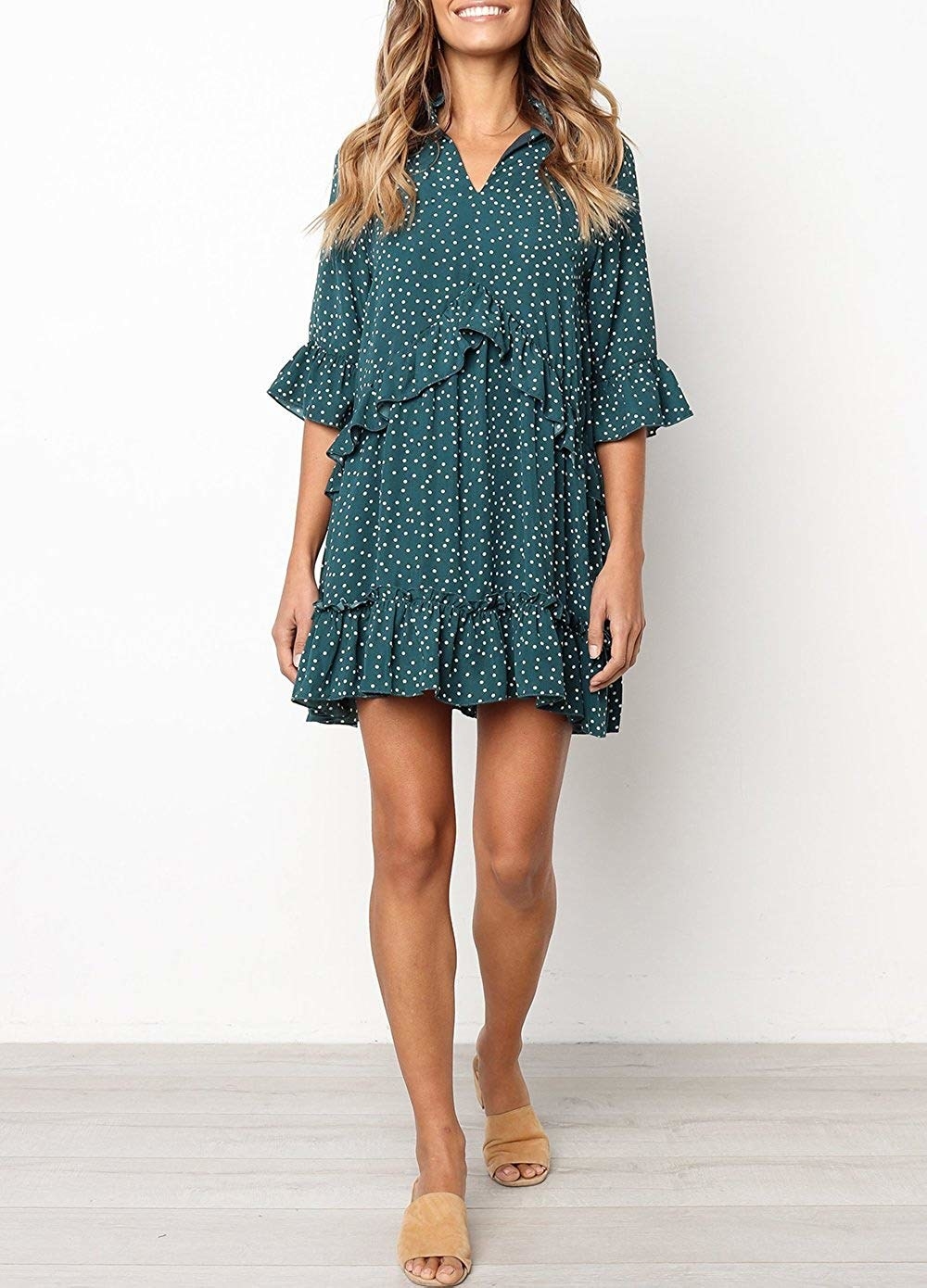 Promising review: "I absolutely love this dress, it fits perfectly and it's so adorable. The first day I wore it I got so many compliments and it was so comfortable. It was nice to wear as a dress or even a long shirt with leggings. The color is really cute too. I definitely recommend it and will probably buy more in different colors!" —Jasmine BallGet it from Amazon for $18.99+ (available in sizes S-XL and in blue, red, and green).