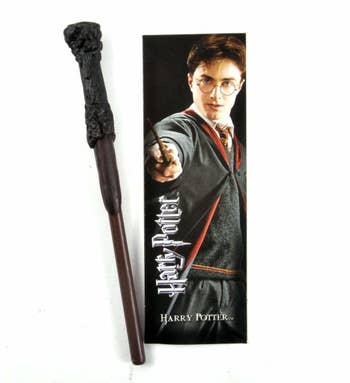 The Harry Potter wand pen and bookmark; the bookmark features a photo of Harry from the movies