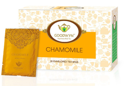 A box of chamomile teabags with a single teabag placed against it.