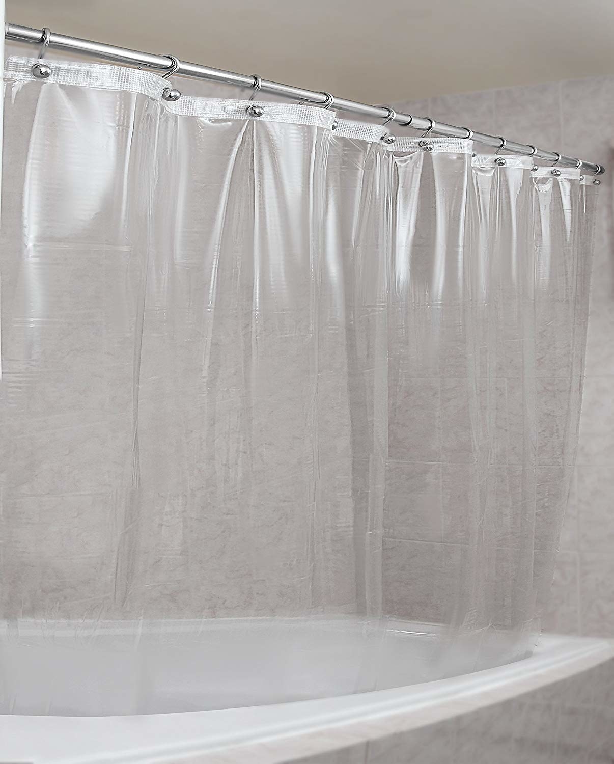 Promising review: "I'm going to publicly admit something on here that I hope my mother never sees, but I have a terrible habit of not keeping the shower too clean. I usually know it's time to clean the tub when it's slick with mildew... but give me a break I'm a full time college student. I legit NEVER cleaned this curtain and it NEVER grew any mold and I've had it for a whole year now. I also like how heavy it is because nothing is worse than fighting off a curtain from sticking to your lower leg in the shower." —luvfishnGet it from Amazon for $13.95.
