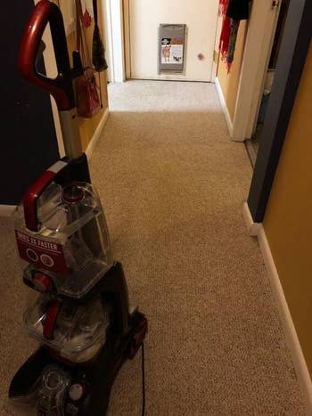 The Hoover machine on the same carpet, showing how clean it is after using