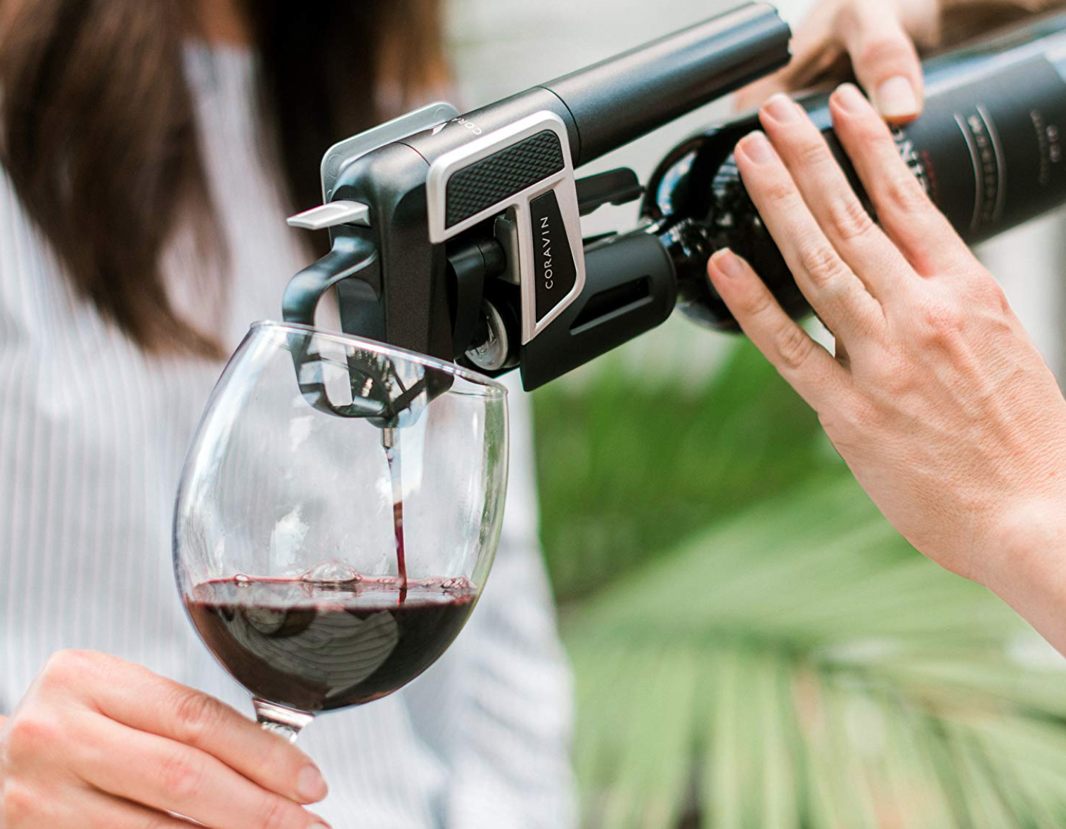 the Coravin wine preserver pouring wine into a glass