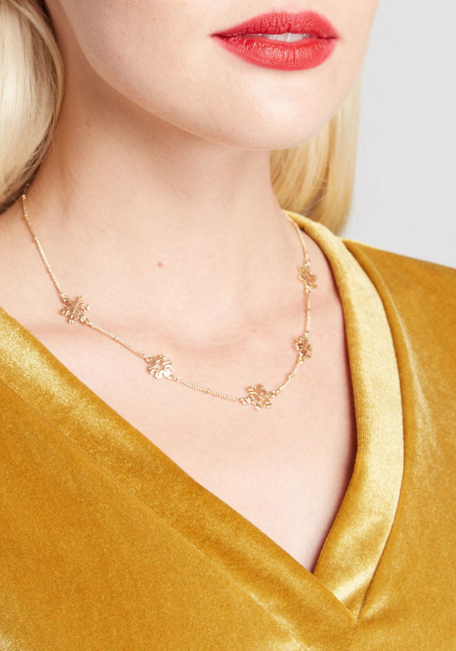 thin gold chain necklace with small diamond