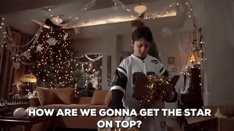 Digging out the boxes from the garage, picking up some new decor at a local department store, jumping to reach the top of the Christmas tree. Y'know, the usual.