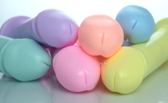 six different pastel-colored silicone dildos
