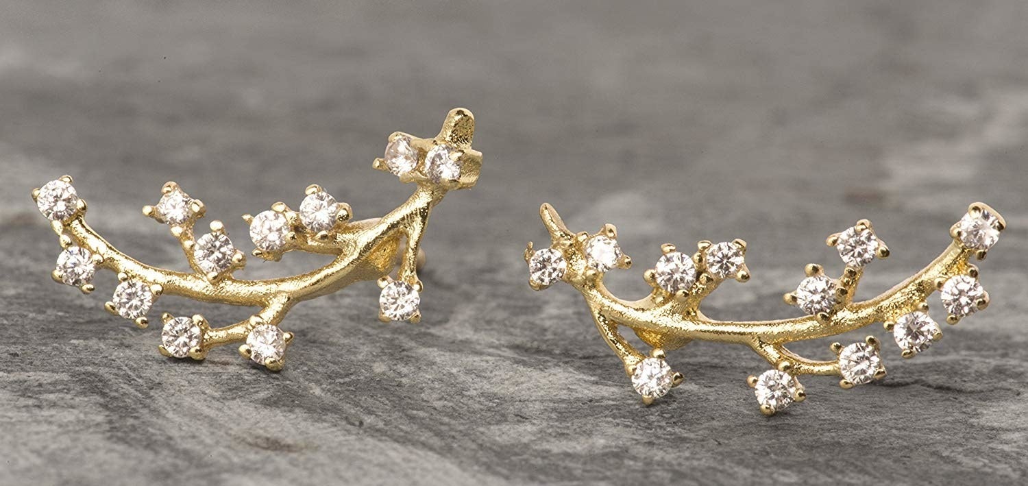 The branch-like earrings with rhinestones on the end of each prong