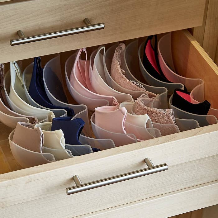 view of inside a dresser drawer with a row of dedicated compartments to hold bras without their cups losing shape