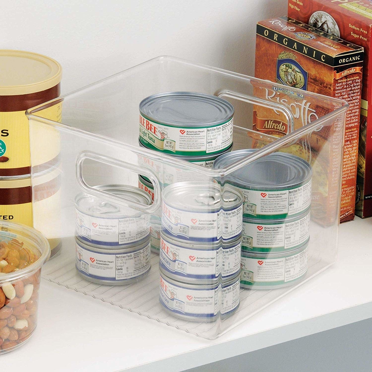 Promising review: "I love these bins: they're sturdy and clear so you can see everything and, best of all, they're straight sided, to maximize space efficiency. Many traditional bins flare out at the top and have protruding handles that actually reduce the amount of storage, but not these. Perfect! My bathroom is finally organized. One caveat: as other have noted, the labels are difficult to remove unless you use a hairdryer, set on high heat, and sssllloowwwwlllyyy pull the labels off as they loosen up. I had no troubles once I figured that part out thanks to other reviews." —AnonGet a set of four from Amazon for $36.90.