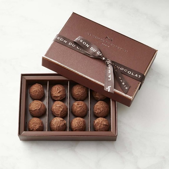 La Maison du Chocolat has been a chocolate lover's staple since its founding back in the 1970s. Its famous European-style truffles are handcrafted from house-blended chocolates sourced from the world's finest crus. To create its signature dark chocolate truffles, master confectioners prepare delicate dark chocolate truffle mousse, enrobe it with a layer of dark chocolate, then dust it with premium cocoa powder. The result is pure chocolate bliss.
