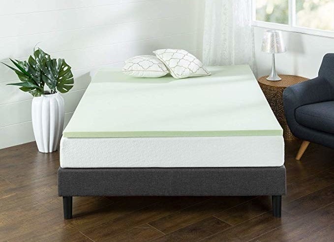 The light green topper on a mattress