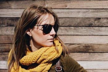 reviewer wearing the mustard yellow scarf