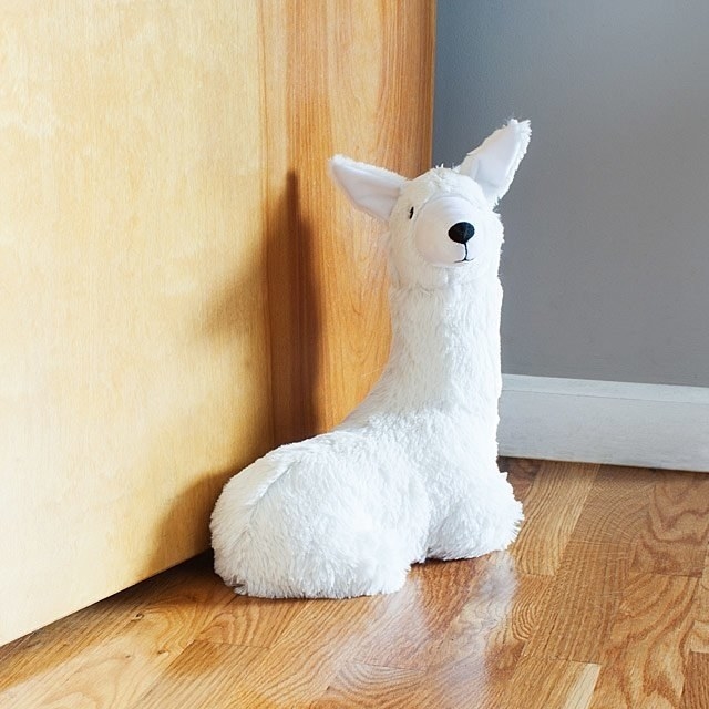 Promising review: "This is so soft and cuddly and adorable it might be hard to leave it sitting on the floor!" —TeebGet it from Uncommon Goods for $32.