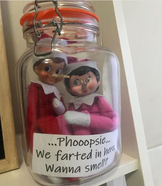 Two elves in a jar with a sign in it: &quot;Phooopsie; we farted in here; wanna smell?&quot;