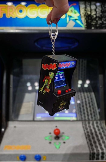 a tiny arcade game on a keychain