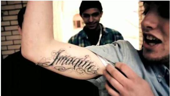 Mac Miller has the words "imagine" tattooed on his right arm. 